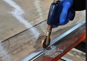Seam-welding fine mesh to framework