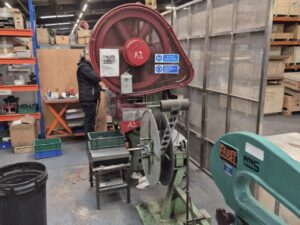 Power pressing of mesh filter components