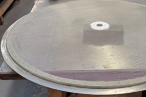 A semi-finished SWECO screen being re-meshed